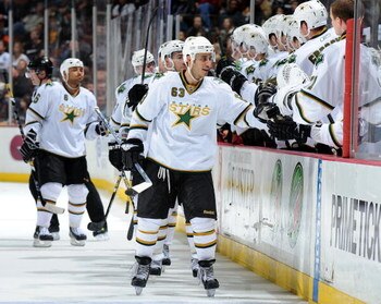 ANAHEIM, CA - MARCH 06:  Mike Ribeiro #63 of the Dallas Stars celebrates his teams goal with the bench for a 3-1 lead over the Anaheim Ducks during the third  period at the Honda Center on March 6, 2009 in Anaheim, California.  (Photo by Harry How/Getty I