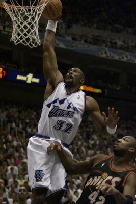 24 Apr 2000:   Karl Malone #32 of the Utah Jazz dunks on Vin Baker #42 of the Seattle Sonics during game 2 of the Western Conference NBA Playoffs at the Delta Center in Salt Lake City, Utah. DIGITAL IMAGE. Mandatory Credit: Jed Jacobsohn/ALLSPORT