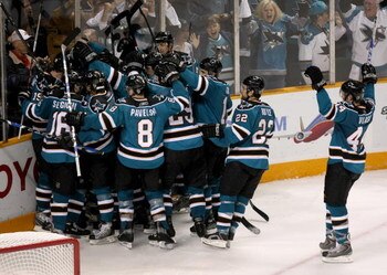 SAN JOSE, CA - APRIL 25:  The San Jose Sharks celebrate after scoring the game winning goal in overtime against the Anaheim Ducks during Game Five of the Western Conference Quarterfinal Round of the 2009 NHL Stanley Cup Playoffs at HP Pavilion on April 25