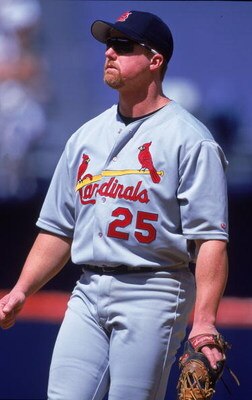 13 Jun 2000:  Mark McGwire #25 of the St Louis Cardinals watches the action during the game against the San Diego Padres at Qualcomm Stadium in San Diego, California.  The Cardinals defeated the Padres 8-3.Mandatory Credit: Tom Hauck  /Allsport
