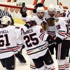DETROIT - MAY 19:  (L-R) Brian Campbell #51, Cam Barker #25, Patrick Sharp #10, Martin Havlat #24 and Jonathan Toews #19 of the Chicago Blackhawks celebrate after Toews scored a power play goal in the first period against the Detroit Red Wings during Game