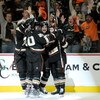 ANAHEIM, CA - MAY 05:  Teemu Selanne #8 of the Anaheim Ducks celebrates with teammates Andrew Ebbett #48 and Ryan Carter #20 after scoring the first goal against the Detroit Red Wings in the first period of Game Three of the Western Conference Semifinal R