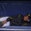 27 May 1992: Second baseman Jose (Chico) Lind of the Pittsburgh Pirates reclines happily on the bench during a game against the San Diego Padres at Jack Murphy Stadium in San Diego, California.
