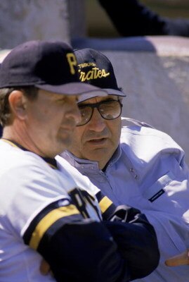 1988:  General manager Syd Thrift, far right, of the Pittsburgh Pirates looks on during a 1988 MLB season game.  (Photo by Rick Stewart/Getty Images)