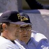 1988:  General manager Syd Thrift, far right, of the Pittsburgh Pirates looks on during a 1988 MLB season game.  (Photo by Rick Stewart/Getty Images)