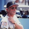 29 MAY 1994:  JIM LEYLAND, MANAGER OF THE PITTSBURGH PIRATES, GIVES A SIGN FROM THE DUGOUT DURING HIS TEAM''S GAME AGAINST THE DODGERS AT DODGER STADIUM IN LOS ANGELES, CALIFORNIA. Mandatory Credit: J.D. Cuban/ALLSPORT