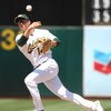 OAKLAND, CA - JULY 01:  Mark Ellis #14 of the Oakland Athletics attempts to throw out Adam Everett in the eighth inning during action against the Detroit Tigers during a Major League Baseball game on July 1, 2009 at the Oakland Coliseum in Oakland, Califo