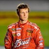 CONCORD, NC - OCTOBER 15:  Kasey Kahne, driver of the #9 Budweiser Dodge, stands on pit road during qualifying for the NASCAR Sprint Cup Series NASCAR Banking 500 at Lowe's Motor Speedway on October 15, 2009 in Concord, North Carolina.  (Photo by John Har