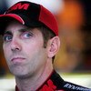 CONCORD, NC - OCTOBER 15:  Greg Biffle, driver of the #16 3M Ford, stands in the garage during practice for the NASCAR Sprint Cup Series NASCAR Banking 500 at Lowe's Motor Speedway on October 15, 2009 in Concord, North Carolina.  (Photo by Sam Greenwood/G