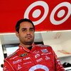 KANSAS CITY, KS - OCTOBER 02: Juan Pablo Montoya, driver of the #42 Target Chevrolet stands in the garage while adjustments are made to his car during practice for the NASCAR Sprint Cup Series Price Chopper 400 presented by Kraft Foods at the Kansas Speed