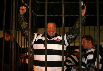 DAVIDSON, NC - OCTOBER 14:  NASCAR driver Kurt Busch (C) is locked up for charity at the NASCAR Second Annual Jail & Bail held at Brickhouse Tavern  October 14, 2009 in Davidson, North Carolina.  Funds raised during the event will go to The NASCAR Foundat