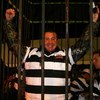 DAVIDSON, NC - OCTOBER 14:  NASCAR driver Kurt Busch (C) is locked up for charity at the NASCAR Second Annual Jail & Bail held at Brickhouse Tavern  October 14, 2009 in Davidson, North Carolina.  Funds raised during the event will go to The NASCAR Foundat