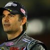 CONCORD, NC - OCTOBER 15:  Jeff Gordon, driver of the #24 Transformers Chevrolet, stands on pit road during qualifying for the NASCAR Sprint Cup Series NASCAR Banking 500 at Lowe's Motor Speedway on October 15, 2009 in Concord, North Carolina.  (Photo by 