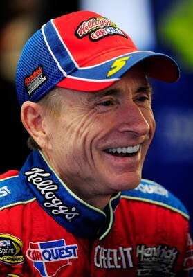 CONCORD, NC - OCTOBER 15:  Mark Martin, driver of the #5 Pop-Tarts Chevrolet, stands in the garage during practice for the NASCAR Sprint Cup Series NASCAR Banking 500 at Lowe's Motor Speedway on October 15, 2009 in Concord, North Carolina.  (Photo by Sam 