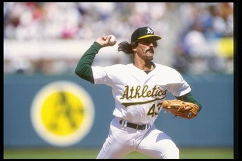 25 Jul 1992:  Pitcher Dennis Eckersley of the Oakland Athletics prepares to throw the ball during a game against the Minnesota Twins. Mandatory Credit: Otto Greule  /Allsport