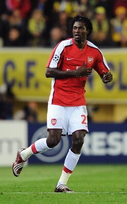VILLARREAL, SPAIN - APRIL 07: Emmanuel Adebayor of Arsenal celebrates scoring his team's first goal during the UEFA Champions League quarter-final first leg match between Villarreal and Arsenal at the Madrigal Stadium on April 7, 2009 in Villarreal, Spai