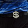 SINGAPORE - SEPTEMBER 10: Shingo Katayama of Japan wears a dollar sign buckle belt on course during the final round of the Singapore Open at the Sentosa Golf Club on September 10, 2006 in Singapore.   (Photo by Stanley Chou/Getty Images)