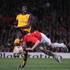MANCHESTER, UNITED KINGDOM - APRIL 29:   Nemanja Vidic of Manchester United dives to block the shot of Emmanuel Adebayor of Arsenal during the UEFA Champions League Semi Final First Leg match between Manchester United and Arsenal at Old Trafford on April 
