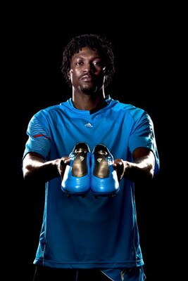 UNDATED - UNSPECIFIED:   In this handout image provided by adidas, Emmanuel Adebayor of Arsenal and Togo with his new adidas F50i football boots and training kit.  (Photo by Getty Images for adidas)