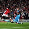 LONDON, ENGLAND - APRIL 15:  Emmanuel Adebayor of Arsenal holds his nerve to score the second goal of the game past goal keeper Diego Lopez of Villarreal during the UEFA Champions League Quarter Final Second Leg match between Arsenal and Villarreal at the