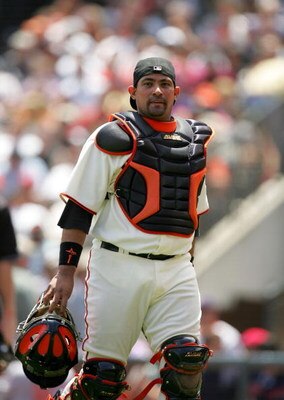 SAN FRANCISCO - JUNE 17:  Bengie Molina #1 of the San Francisco Giants walks back to the dugout in between innings during their game against the Los Angeles Angels of Anaheim at AT&T Park on June 17, 2009 in San Francisco, California.  (Photo by Ezra Shaw
