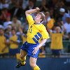 24 JUN 1994:  THOMAS BROLIN OF SWEDEN LEAPS FOR JOY AFTER SCORING AGAINST RUSSIA DURING THE  1994 WORLD CUP AT THE SILVERDOME IN PONTIAC, MICHIGAN.  THE FIRST-HALF GOAL TIED THE GAME AT 1-1. Mandatory Credit: JONATHAN DANIEL/ALLSPORT
