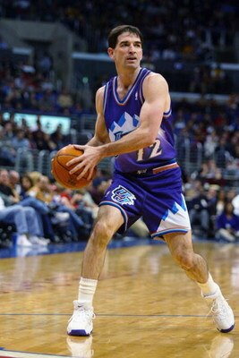 LOS ANGELES - APRIL 1:  John Stockton #12 of the Utah Jazz looks to pass during the game against the Los Angeles Clippers at Staples Center on April 1, 2003 in Los Angeles, California.  The Jazz won 94-89.  NOTE TO USER: User expressly acknowledges and ag
