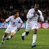 BLOEMFONTEIN, SOUTH AFRICA - JUNE 24:  Jozy Altidore (R) of USA celebrates scoring his sides opening goal with his teammate Charlie Davies during the FIFA Confederations Cup Semi Final match between Spain and USA at Free State Stadium on June 24, 2009 in 