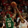 CHICAGO - APRIL 30: Derrick Rose #1 of the Chicago Bulls blocks a shot in the closing seconds of the third overtime period by Rajon Rondo #9 of the Boston Celtics in Game Six of the Eastern Conference Quarterfinals during the 2009 NBA Playoffs at the Unit