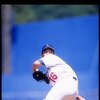 30 Jul 1995: Pitcher Hideo Nomo of the Los Angeles Dodgers winds up for the pitch during a game against the Cincinnati Reds at Dodger Stadium in Los Angeles, California.  The Dodgers won the game 5-4. Mandatory Credit: Simon Barnett  /Allsport