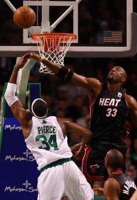 BOSTON - NOVEMBER 16:  Paul Pierce #34 of the Boston Celtics tries to get a shot as Alonzo Mourning #33 of the Miami Heat defends on November 16, 2007 at the TD Banknorth Garden in Boston, Massachusetts. NOTE TO USER: User expressly acknowledges and agree