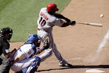 NEW YORK - JUNE 12:  Justin Upton #10 of the Arizona Diamonbacks hits a double in the tenth inning against the New York Mets on June 12, 2008 at Shea Stadium in the Flushing neighborhood of the Queens borough of New York City. The Diamondbacks defeated th
