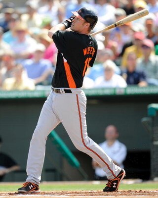 JUPITER, FL - FEBRUARY 27: Matt Wieters #15 of the Baltimore Orioles bats against the Florida Marlins during a spring training game at Roger Dean Stadium on February 27, 2009 in Jupiter, Florida. (Photo by Rob Tringali/Getty Images)