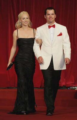 KILDARE, IRELAND - SEPTEMBER 20:  Paul Casey and Jocelyn Hefner walk down the catwalk during the Ryder Cup Gala Dinner at Citywest Hotel and Golf Resort September 20, 2006 in Dublin, Ireland.  (Photo by David Cannon/Getty Images)