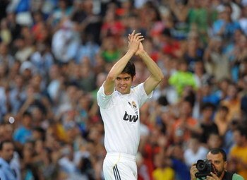 MADRID, SPAIN - JUNE 30:  New signing Kaka waves to fans during his official presentation as a Real Madrid player at the Santiago Bernabeu Stadium on June 30, 2009 in Madrid, Spain.  (Photo by Denis Doyle/Getty Images)
