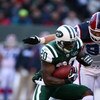 EAST RUTHERFORD, NJ - DECEMBER 14:  Thomas Jones #20 of The New York Jets runs the ball against  The Buffalo Bills during their game on December 14, 2008 at Giants Stadium in East Rutherford, New Jersey.  (Photo by Al Bello/Getty Images)