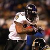 PITTSBURGH - JANUARY 18:  Willis McGahee #23 of the Baltimore Ravens scores a 1-yard rushing touchdown in the fourth quarter against Larry Foote #50 of the Pittsburgh Steelers during the AFC Championship game on January 18, 2009 at Heinz Field in Pittsbur