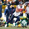 GREEN BAY, WI - DECEMBER 07:  Wide receiver Kevin Walter #83 of the Houston Texans runs for a touchdown after a reception during the first quarter against the Green Bay Packers at Lambeau Field on December 7, 2008 in Green Bay, Wisconsin.  (Photo by Jeff 