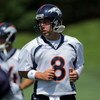 ENGLEWOOD, CO - JUNE 12:  Quarterback Kyle Orton #8 of the Denver Broncos warms up during minicamp practice at the Broncos Dove Valley training facility on June 12, 2009 in Englewood, Colorado.  (Photo by Doug Pensinger/Getty Images)
