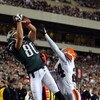 PHILADELPHIA - DECEMBER 15:  Kevin Curtis #80 of the Philadelphia Eagles catches a touchdown pass in the first quarter as Eric Wright #24 of the Cleveland Browns covers him on December 15, 2008 at Lincoln Financial Field in Philadelphia, Pennsylvania.  (P