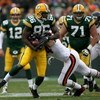 GREEN BAY, WI - NOVEMBER 16:  Tight end Donald Lee #86 of the Green Bay Packers makes a third down reception and is stopped short of the first down by linebacker Brian Urlacher #54 of the Chicago Bears during the NFL game at Lambeau Field on November 16, 
