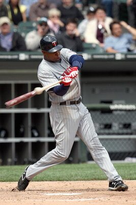 CHICAGO - MAY 08:  Delmon Young #21 of the Minnesota Twins swings at a pitch during the game against the Chicago White Sox on May 8, 2008 at U.S. Cellular Field in Chicago, Illinois. (Photo by Jonathan Daniel/Getty Images) 
