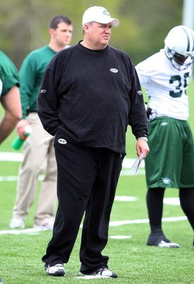 FLORHAM PARK, NJ - MAY 02:  Head coach Rex Ryan of the New York Jets walks on the field during minicamp on May 2, 2009 at the Atlantic Health Jets Training Center in Florham Park, New Jersey.  (Photo by Jim McIsaac/Getty Images)