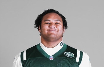 EAST RUTHERFORD, NJ - 2005:  Sione Pouha of the New York Jets poses for his 2005 NFL headshot at photo day in East Rutherford, New Jersey.  (Photo by Getty Images) 