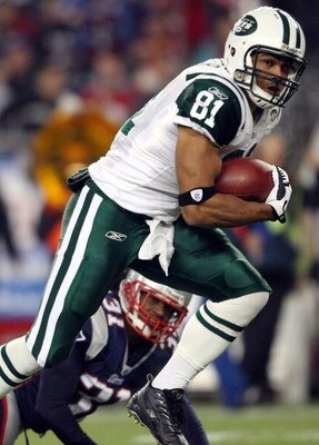 FOXBORO, MA - NOVEMBER 13:  Dustin Keller #81 of the New York Jets runs past Brandon Meriweather #31 of the New England Patriots on November 13, 2008 at Gillette Stadium in Foxboro, Massachusetts.  (Photo by Elsa/Getty Images)