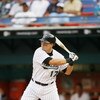 MIAMI - APRIL 11:  Mike Jacobs #17 of the Florida Marlins bats against the San Diego Padres during the home opener at Dolphin Stadium on April 11, 2006  in Miami, Florida. The Padres defeated the Marlins 9-3.  (Photo by Eliot J. Schechter/Getty Images)