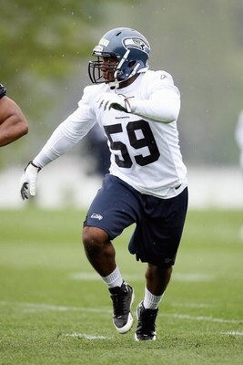 RENTON, WA - MAY 2:  Aaron Curry #59 of the Seattle Seahawks runs drills during minicamp at the Seahawks training facility on May 2, 2009 in Renton, Washington. (Photo by Otto Greule Jr/Getty Images) 