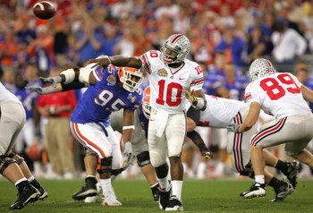 GLENDALE, AZ - JANUARY 08:  Quarterback Troy Smith #10 of the Ohio State Buckeyes attempts a pass against the Florida Gators during the 2007 Tostitos BCS National Championship Game at the University of Phoenix Stadium on January 8, 2007 in Glendale, Arizo
