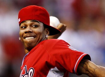 ST. LOUIS - JULY 12: Rapper Nelly throws during the Taco Bell All-Star Legends & Celebrity Softball Game at Busch Stadium on July 12, 2009 in St. Louis, Missouri. (Photo by Dilip Vishwanat/Getty Images)