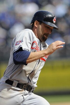 KANSAS CITY, MO - APRIL 15:  Mark Derosa of the Cleveland Indians, wearing a #42 jersey during the Jackie Robinson Day game runs past third base on the way to scoring a run against the Kansas City Royals on April 15, 2009 at Kauffman Stadium in Kansas Cit